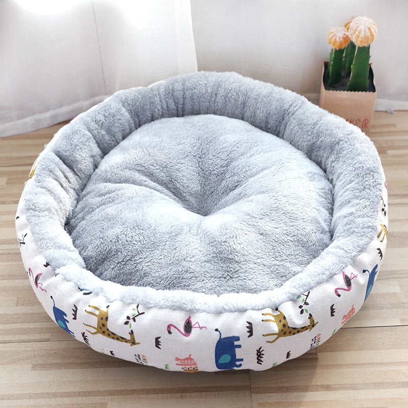 Content cat curled up comfortably in a blue FurryFable round pet bed