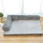 Small dog curled up in a FurryFable Corduroy Pet Sofa Bed (size S)