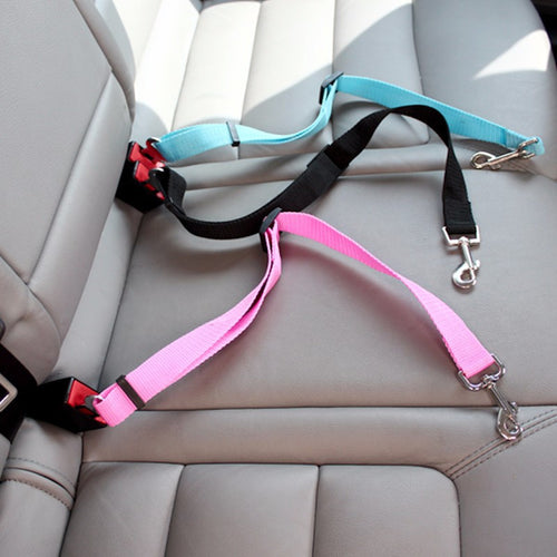Close-up of the FurryFable Adjustable Dog Car Seat Belt showing the durable black nylon strap and universal metal seatbelt clip.