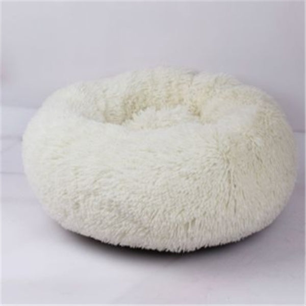 FurryFable pet bed in apricot, providing a warm spot for a pet to rest