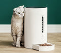 FurryFable Automatic Pet Food Dispenser with a cat approaching, demonstrating ease of use for felines.