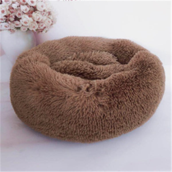 Multiple FurryFable calming beds in various colors and sizes displayed