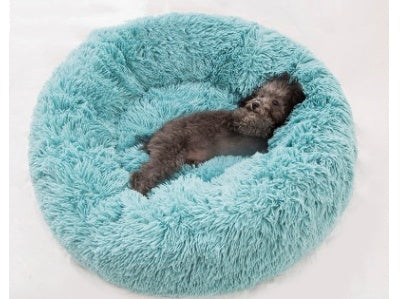 FurryFable luxury pet bed on a hardwood floor, showcasing its non-slip base