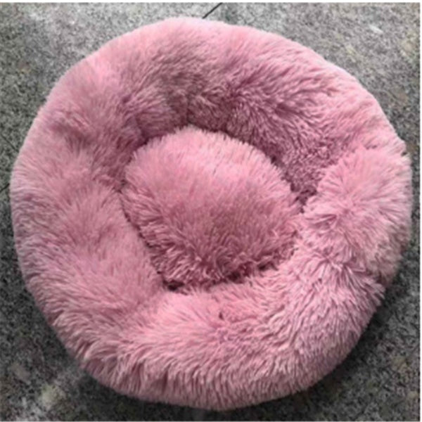 The plush texture and round shape of the FurryFable pet bed from above