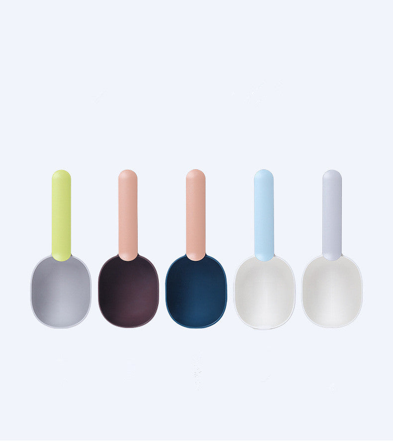 FurryFable ergonomic pet food spoon in blue and white, scooping kibble