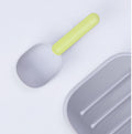 White and gray FurryFable pet food spoon, highlighting its smooth, easy-to-clean surface