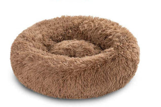 The FurryFable pet bed being machine washed, highlighting its easy care